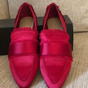 Red satin flats.